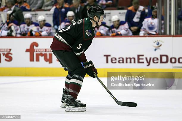 Arizona Coyotes defenseman Connor Murphy gets into position before a face-off during the NHL hockey game between the Edmonton Oilers and the Arizona...