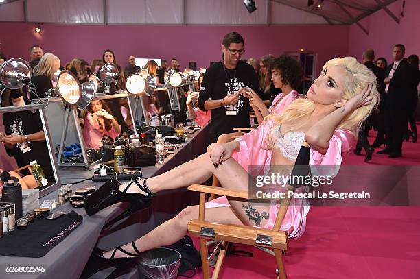 Lady Gaga prepares backstage prior to the Victoria's Secret Fashion Show on November 30, 2016 in Paris, France.