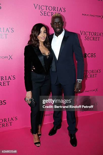 Football player Mamadou Sakho and his wife Majda attend the 2016 Victoria's Secret Fashion Show. Held at Grand Palais on November 30, 2016 in Paris,...