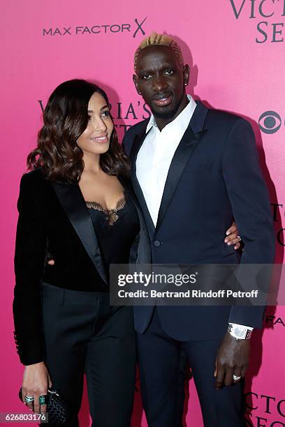 Football player Mamadou Sakho and his wife Majda attend the 2016 Victoria's Secret Fashion Show. Held at Grand Palais on November 30, 2016 in Paris,...