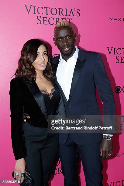 Football player Mamadou Sakho and his wife Majda attend the 2016 Victoria's Secret Fashion Show. Held at Grand Palais on November 30, 2016 in Paris,...