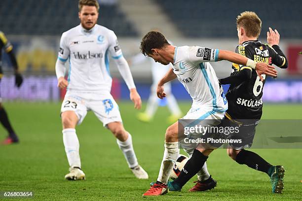 Brecht Dejaegere midfielder of KAA Gent and Ari Freyr Skulason of sporting lokeren during the Croky Cup match between KAA Gent and KSC LOKEREN in the...