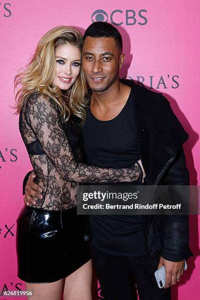 Model Doutzen Kroes and her husband DJ Sunnery James attend the 2016 Victoria's Secret Fashion Show. Held at Grand Palais on November 30, 2016 in...