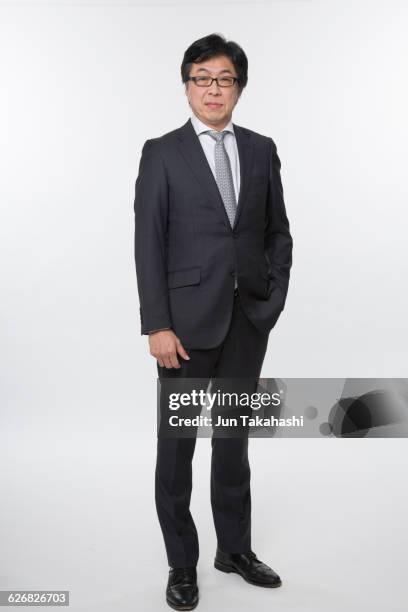 portrait of japanease man - man in black suit full body stock pictures, royalty-free photos & images