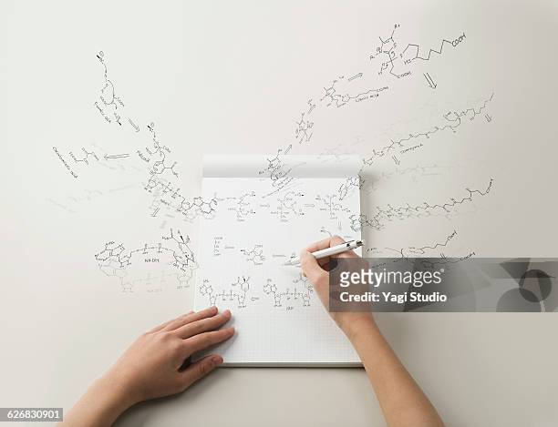 reaction formula of metabolism - human hand drawing stock pictures, royalty-free photos & images