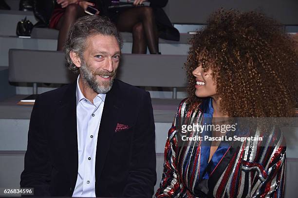 Vincent Cassel and Tina Kunakey attend the Victoria's Secret Fashion Show on November 30, 2016 in Paris, France.