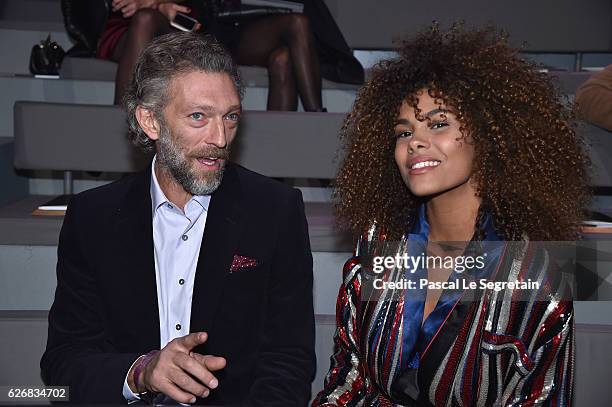 Vincent Cassel and Tina Kunakey attend the Victoria's Secret Fashion Show on November 30, 2016 in Paris, France.