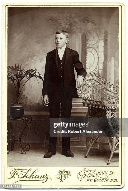 Cabinet card photograph of a well-dressed young man, circa 1890, from the studio of photographer F. Schanz in Fort Wayne, Indiana. Cabinet cards,...