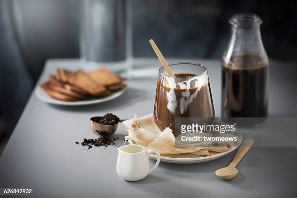 coffee with condense milk. - condensed milk foto e immagini stock