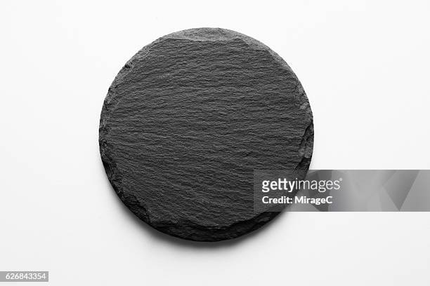 round shape slate stone coaster - black stone bildbanksfoton och bilder