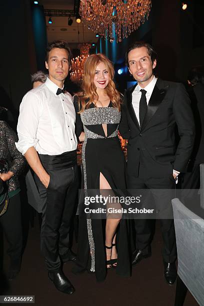 Florian David Fitz Palina Rojinski and producer of 'Willkommen bei den Hartmanns' Quirin Berg during the Bambi Awards 2016 party at Atrium Tower on...