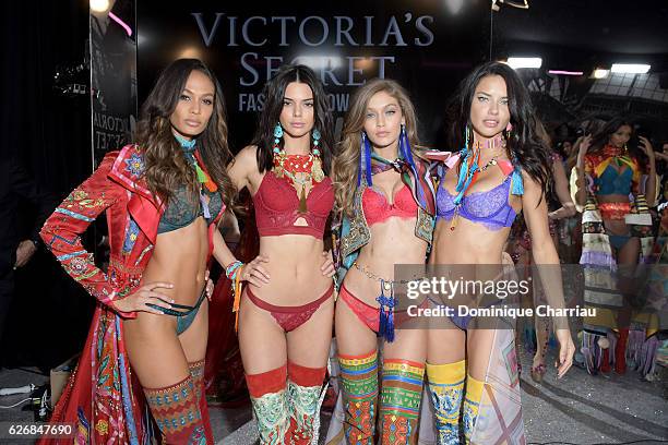 Joan Smalls, Kendall Jenner, Gigi Hadid and Adriana Lima poses backstage during the Victoria's Secret Fashion Show on November 30, 2016 in Paris,...