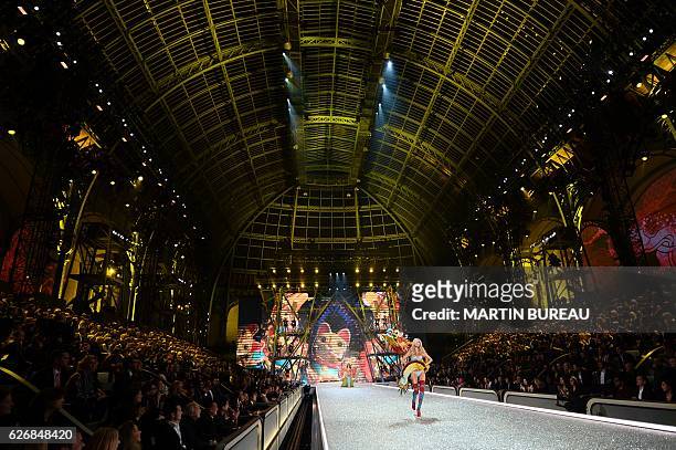 Swedish model Elsa Hosk presents a creation during the 2016 Victoria's Secret Fashion Show at the Grand Palais in Paris on November 30, 2016. / AFP /...