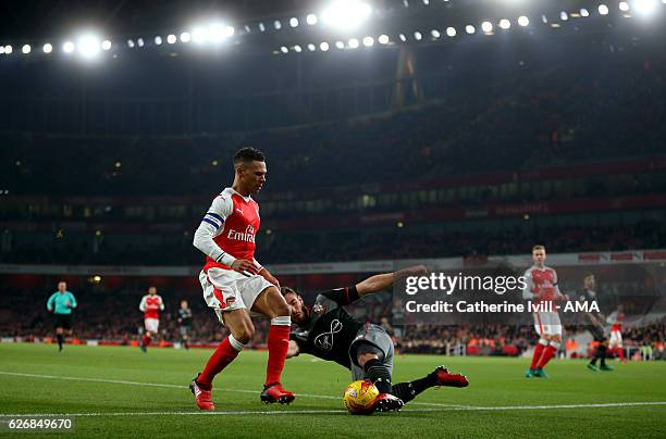 Kieran Gibbs of Arsenal and Sam McQueen of Southampton during the EFL Quarter Final Cup match between Arsenal and Southampton at Emirates Stadium on...