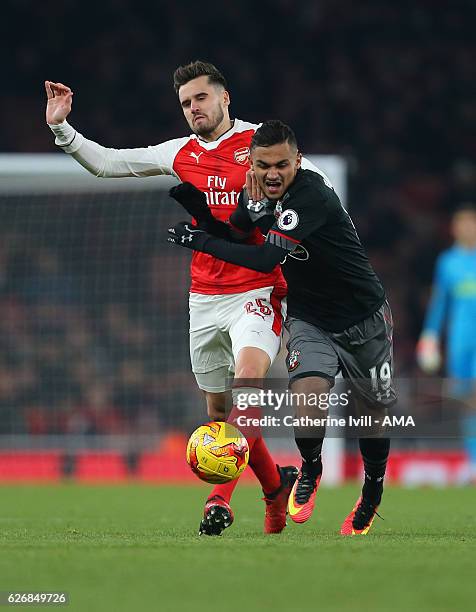 Carl Jenkinson of Arsenal and Sofiane Boufal of Southampton during the EFL Quarter Final Cup match between Arsenal and Southampton at Emirates...