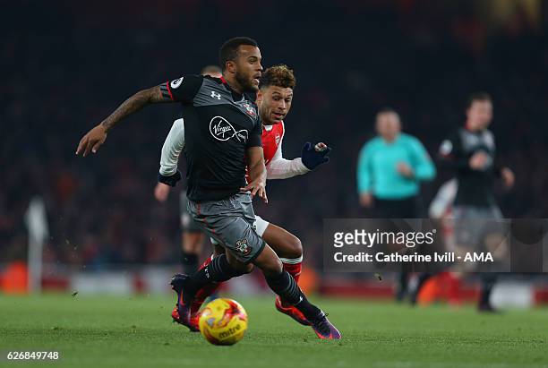 Ryan Bertrand of Southampton and Alex Oxlade-Chamberlain of Arsenal during the EFL Quarter Final Cup match between Arsenal and Southampton at...