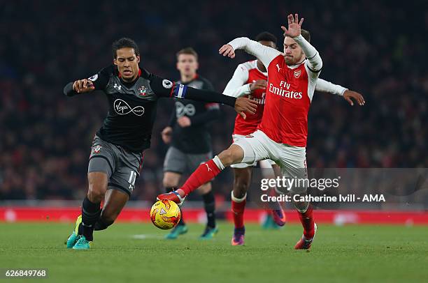 Virgil van Dijk of Southampton and Aaron Ramsey of Arsenal during the EFL Quarter Final Cup match between Arsenal and Southampton at Emirates Stadium...