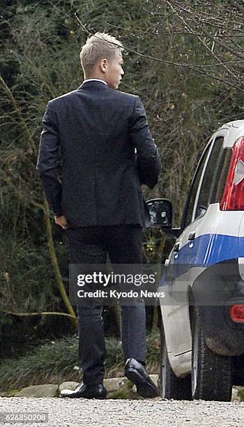 Italy - Japan's Keisuke Honda arrives at AC Milan's training ground in Carnago, Italy, on Jan. 8 after attending a press conference in Milan in which...