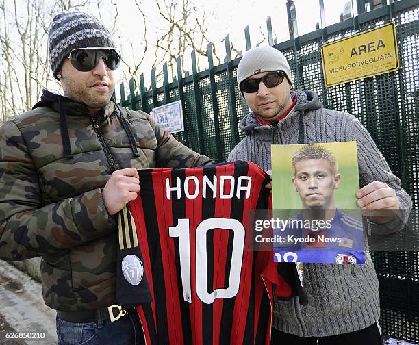 Italy - Supporters wait for the arrival of Japan's Keisuke Honda at AC Milan's training ground in Carnago, Italy, on Jan. 8, 2014. Honda attended...