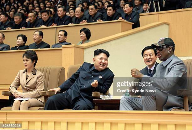 North Korea - Former U.S. Basketball star Dennis Rodman and North Korean leader Kim Jong Un chat while watching an exhibition basketball game between...