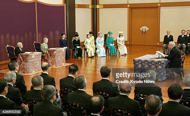 Japan - Emperor Akihito, Empress Michiko and other imperial family members attend a lecture given by a top researcher on Jan. 10 during the annual...