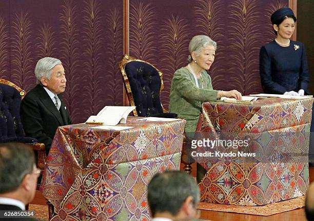 Japan - Emperor Akihito and Empress Michiko attend a lecture from a top researcher on Jan. 10 during the annual "kosho hajime no gi" event, part of...
