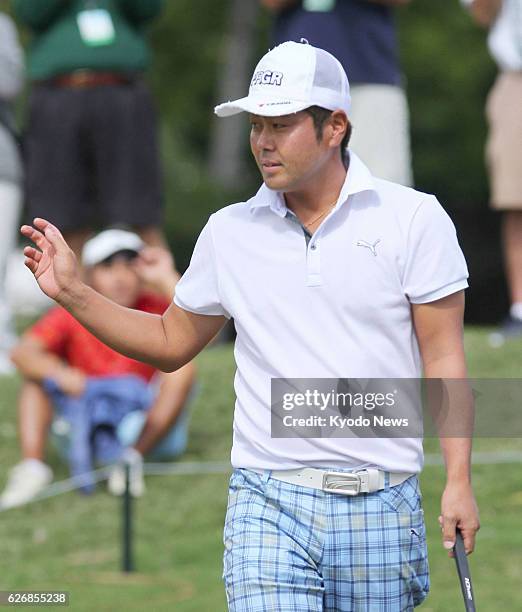 United States - Japan's Hideto Tanihara acknowledges the crowd during the second round of the Sony Open at the Waialae Country Club in Honolulu,...