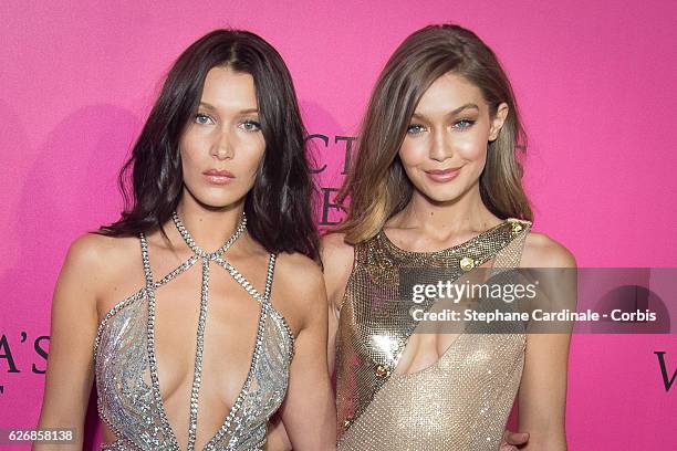 Bella Hadid and Gigi Hadid attend the 2016 Victoria's Secret Fashion Show after party at Le Grand Palais on November 30, 2016 in Paris, France.