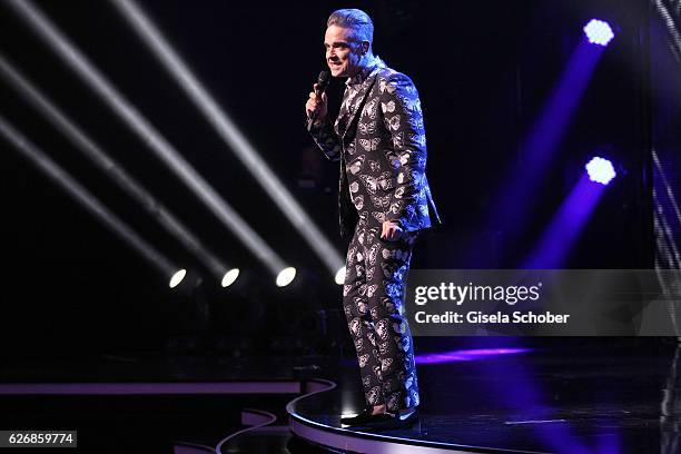Robbie Williams performs during the Bambi Awards 2016 show at Stage Theater on November 17, 2016 in Berlin, Germany.