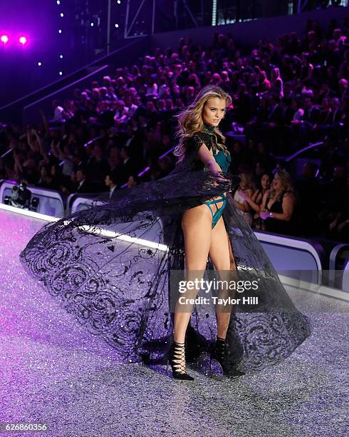 Kate Grigorieva walks the runway during the 2016 Victoria's Secret Fashion Show at Le Grand Palais on November 30, 2016 in Paris, France.