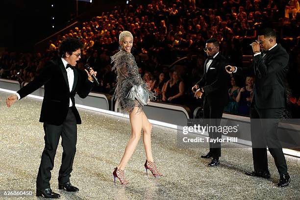 Bruno Mars and Jourdana Phillips dance during the 2016 Victoria's Secret Fashion Show at Le Grand Palais on November 30, 2016 in Paris, France.