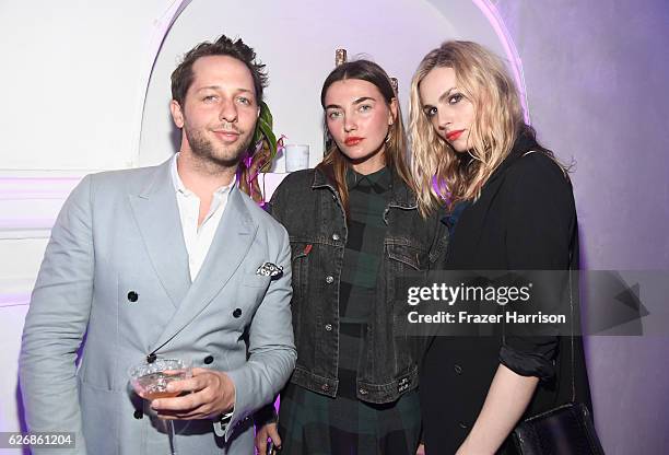 Derek Blasberg, Models Alina Baikova and Andreja Pejic attends L'Eden By Perrier-Jouet Cocktail Party With Derek Blasberg on November 30, 2016 in...