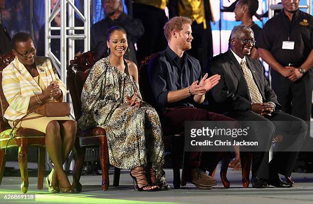 Prince Harry, singer Rihanna, Senator, the Honourable Maxine McClean and Prime Minister of Barbados Freundel Stuart attend a Golden Anniversary...