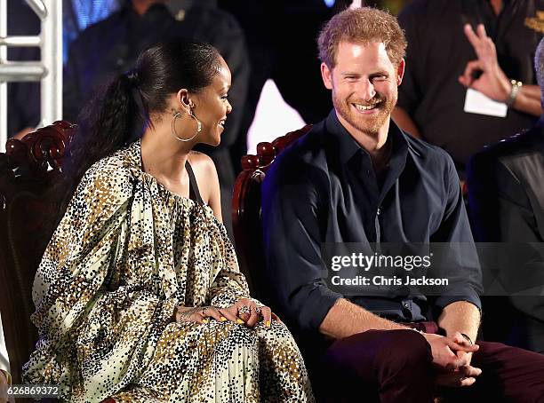 Prince Harry and singer Rihanna attend a Golden Anniversary Spectacular Mega Concert at the Kensington Oval Cricket Ground on day 10 of an official...