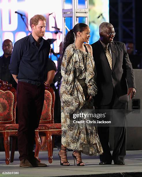 Prince Harry, singer Rihanna and Prime Minister of Barbados Freundel Stuart attend a Golden Anniversary Spectacular Mega Concert at the Kensington...