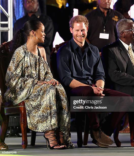 Prince Harry and singer Rihanna attend a Golden Anniversary Spectacular Mega Concert at the Kensington Oval Cricket Ground on day 10 of an official...