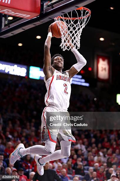 Kobi Simmons of the Arizona Wildcats dunks during the first half of the NCAA college basketball game against the Texas Southern Tigers at McKale...