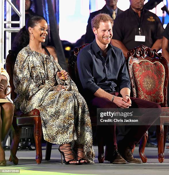 Prince Harry and singer Rihanna attend a Golden Anniversary Spectacular Mega Concert at the Kensington Oval Cricket Ground on day 10 of an official...