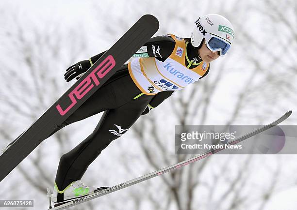 Japan - Japanese Sochi Olympic gold medal hope Sara Takanashi soars into the air at the women's ski jumping World Cup event in Yamagata on Jan. 18,...