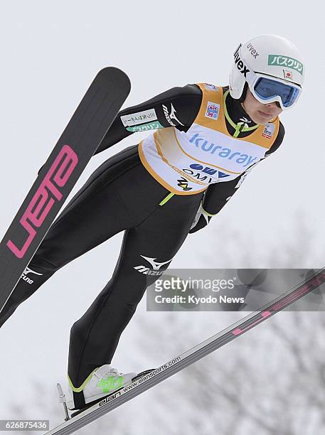 Japan - Japanese Sochi Olympic gold medal hope Sara Takanashi soars into the air at the women's ski jumping World Cup event in Yamagata on Jan. 18,...