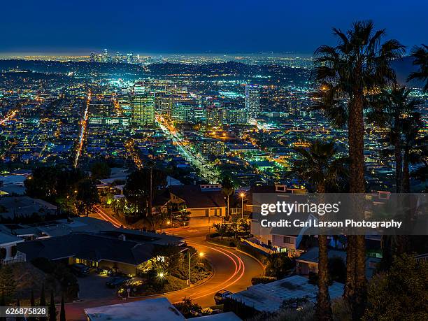 glendale and los angeles skylines at night - glendale kalifornien bildbanksfoton och bilder