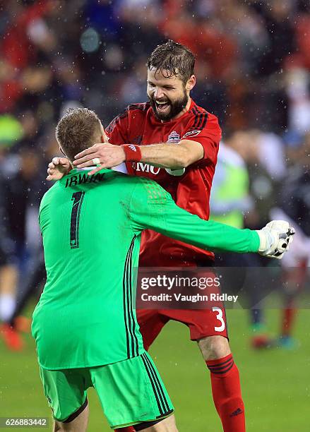 Drew Moor of Toronto FC celebrates with Clint Irwin at the final whistle following the MLS Eastern Conference Final, Leg 2 game against Montreal...