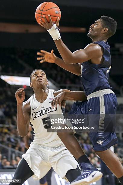 Jaleen Smith Guard for University of New Hampshire shoots the lay-up during the game between the Providence College Friars and the University of New...