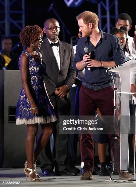 Prince Harry and Jamilla Sealy attend a Golden Anniversary Spectacular Mega Concert at the Kensington Oval Cricket Ground on day 10 of an official...