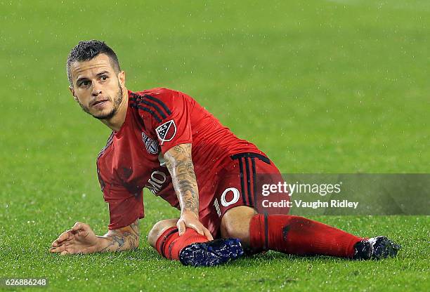 Sebastian Giovinco of Toronto FC injures his calf during the second half of the MLS Eastern Conference Final, Leg 2 game against Montreal Impact at...