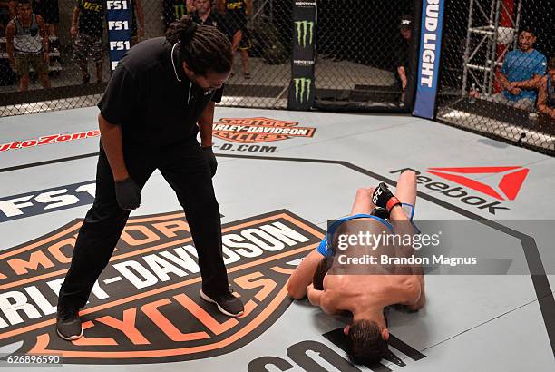 Tim Elliot attempts to submit Hiromasa Ogikubo during the filming of The Ultimate Fighter: Team Benavidez vs Team Cejudo at the UFC TUF Gym on August...