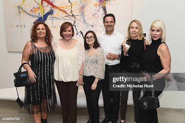Guests enjoy the Poltrona Frau Miami Reception for Artist Andrea Sampaolo at Poltrona Frau Showroom on November 30, 2016 in Miami, Florida.
