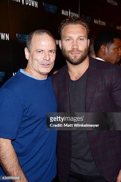 Director Dito Montiel and actor Jai Courtney attend the premiere of Lionsgate Premiere's "Man Down" at ArcLight Hollywood on November 30, 2016 in...