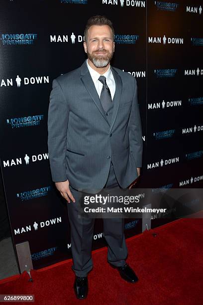 Writer Adam G. Simon attends the premiere of Lionsgate Premiere's "Man Down" at ArcLight Hollywood on November 30, 2016 in Hollywood, California.