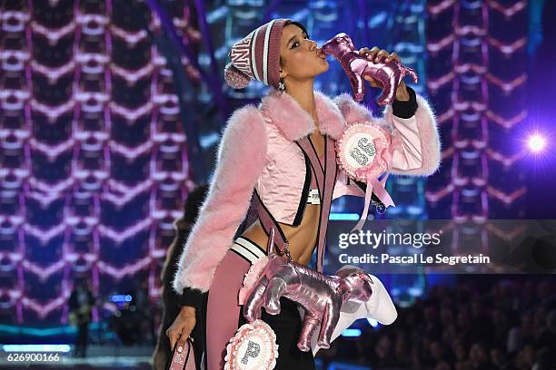 Dilone walks the runway at the Victoria's Secret Fashion Show on November 30, 2016 in Paris, France.